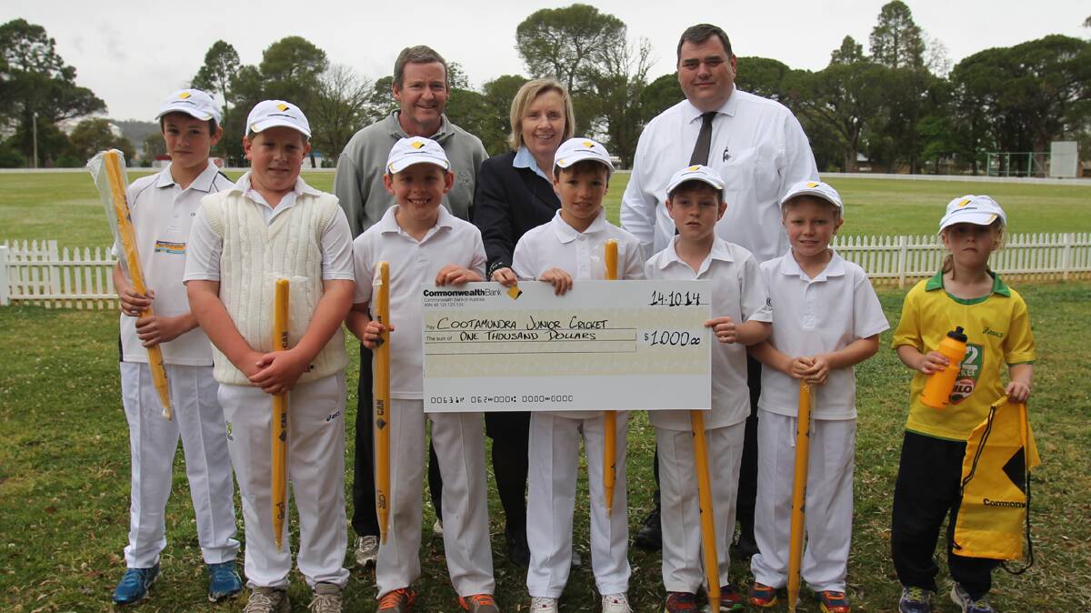 GRANTS FOR GRASSROOTS: CommBank Cricket Club presented Cootamundra Junior Cricket Club with gear and a $1000 cash grant on Tuesday. At Albert Park for the presentation was (from back left) CJCC vice president Bruce Webb, secretary Alison Kerrison and Cootamundra CBA branch manager Mark Gash, and (from front left) junior cricketers Ted Hines, Lachlan Sedgwick, Lachlan Webb, Jed Guthrie, Sam Gash, James Paterson and Emily Gash.