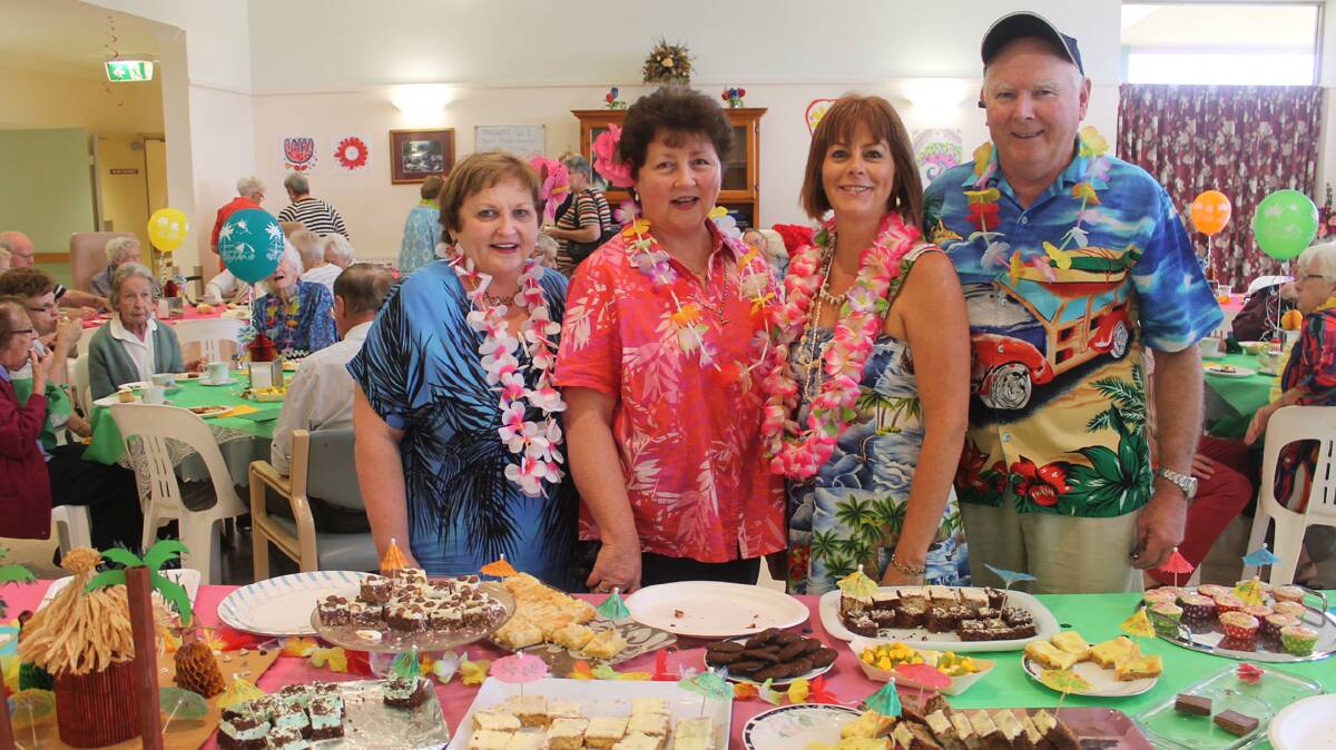  ALOHA: Getting in on the action as part of a Hawaiian themed fundraiser at the Cootamundra Nursing Home last week for the internal sprinkler system are (from left) director of nursing Anne Dawes, Nursing Home employees Gaye Johnson, Tracey Watson and board member Ken Turner. 