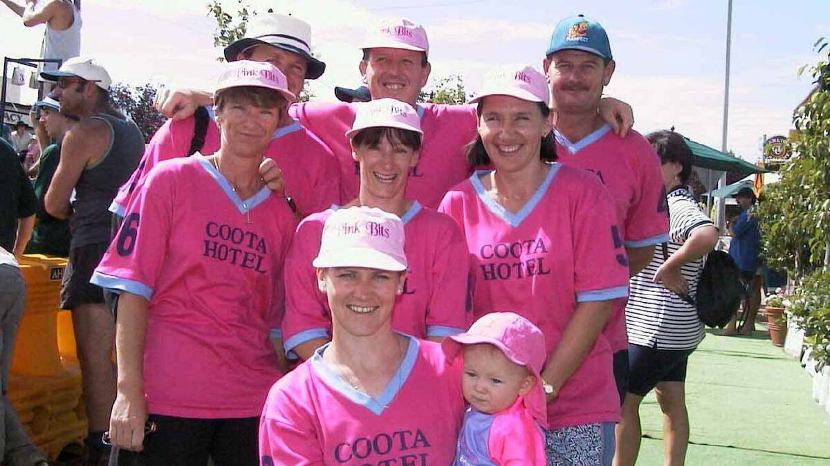  COOTA HOTEL PINK BITS: Enjoying themselves during the 2001 Coota Beach Volleyball Carnival are (back, from left) Mark Ballard, Chris Magee and Noel Grant (middle row) Leanne Ballard, Jo Bennett and Carol Grant (front) Lynne Magee with team mascot Madeleine Magee. 
