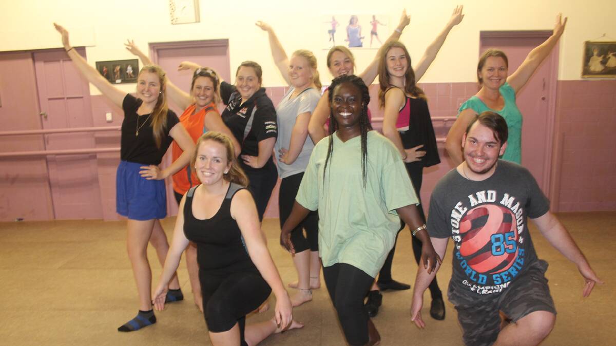  LOADS OF FUN: This happy group of dancers did not stop laughing during Tuesday’s African contemporary dance class. More about fitness than technique it is a class open to absolutely everyone. Pictured (back from left) are Maddi Baker, Melissa Kelleher, Nicole Kelleher, Jess Dodwell, Christine Wishart, Sarah Stephens and Meredith Charleston (front) Chloe Waters, instructor Elsie Tweneboa and Thomas Worthington. 