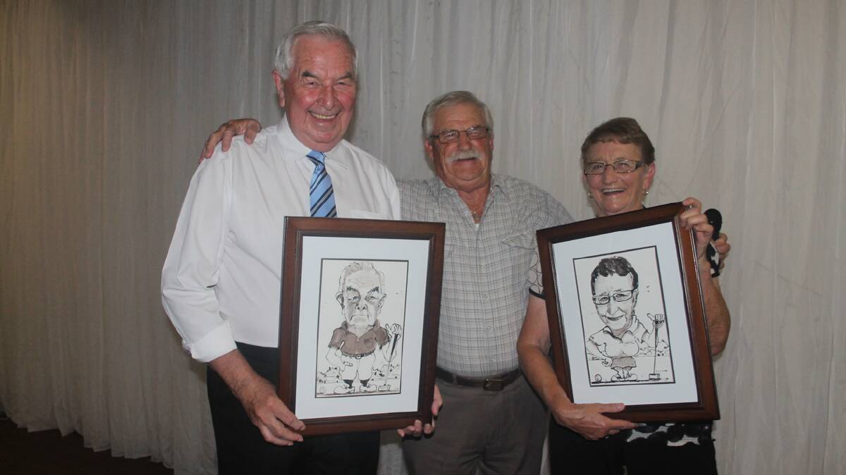  HONOURED WITH A SKETCH: NSW Veteran’s Golf Association Councillor Col Darley (centre) presents Brian Phillips and Gail Lynch with a sketch for all of their effort with the Cootamundra Veteran’s Week of Golf. Gail started the tournament many years ago and Brian, with wife Marsha, is still an integral part of the tournament. 