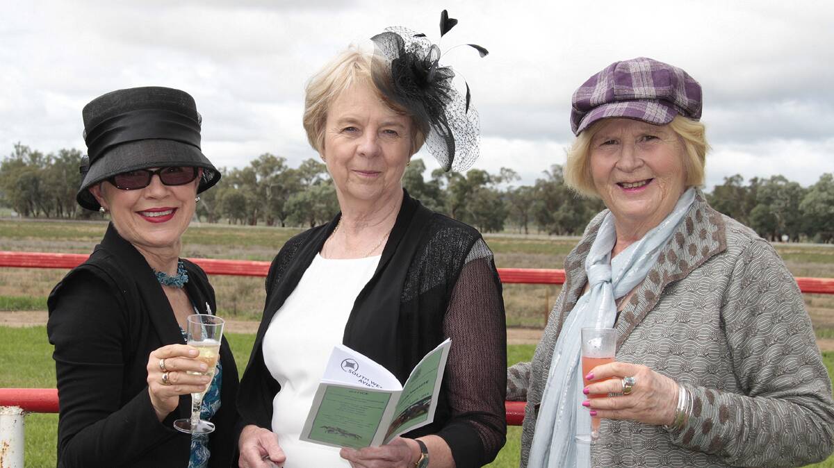 FORM: Pictured picking a winner at the Cootamundra Picnic Races on Saturday were (from left) Leigh Bowden Cootamundra, Geraldine Hefferan of Inverloch and Caroline Howse of Cootamundra.