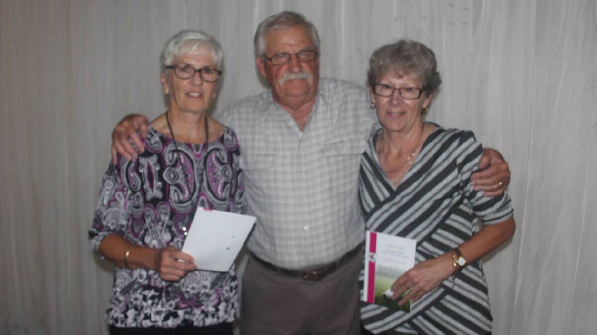  WINNERS: Claiming the NSW Veteran’s Golf Association awards were Jenny Smith of Campbelltown in second place with 31 points and Gloria Davis of Nowra who claimed first on a countback. They are pictured with Col Darley of the 
NSWVGA. 
