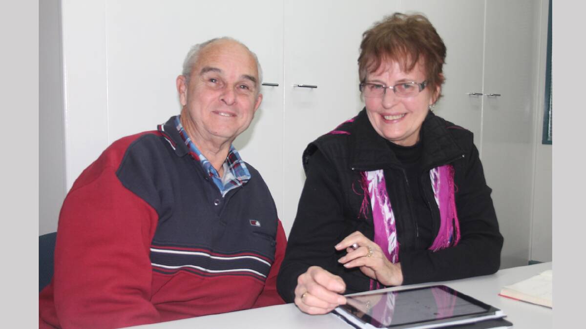 LEARNING NEW SKILLS: Pictured are Terry and Marilyn Hart at the iPad for beginners class held at the Cootamundra library on Wednesday.