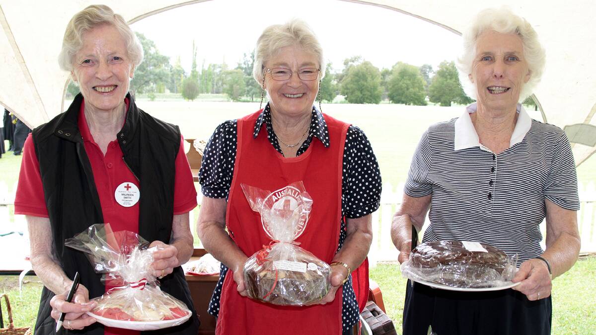 DELICIOUS TREATS: Manning the cake stall on Saturday were (from left) Maureen Smith of Cootamundra Red Cross, Marcia Thorburn of Wallendbeen Red Cross and Judy Mactier a helper for Cootamundra.