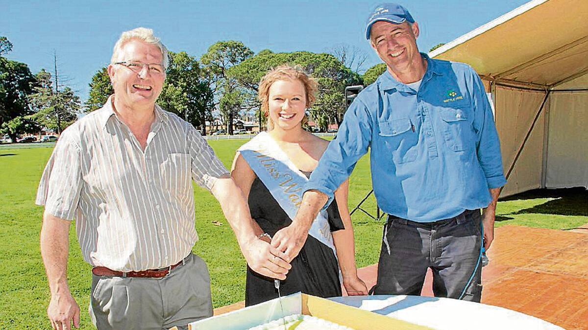 GREAT DAY: At the opening of last year’s Wattle Time Fair are (from left) mayor at the time Doug Phillips, 2013 Miss Wattle Amanda Ingham and Cootamundra Development Corporation chairman John Stephens. 
