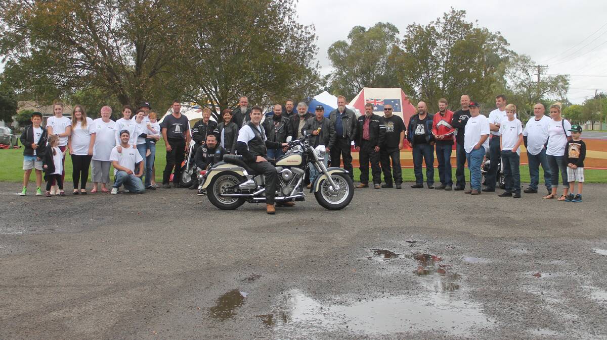  SPECIAL DAY: The Cootamundra contingent of riders from Tubby’s Ride stop for a photo with one of the organisers Damien Holder in front on the Harley Davidson of his late father Phillip ‘Tubby’ Holder. 
Photo: Melinda Chambers 