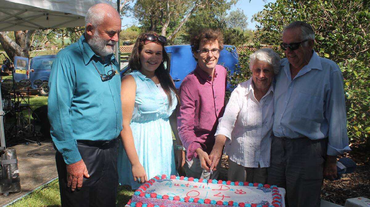 PROUD MOMENT: The honour of cutting the Australia Day cake in Jubilee Park was shared between (from left) Cootamundra Citizen of the Year John Paterson, Young Person of the Year Sammy Maxwell, ambassador Matt Levy and Contribution to Cootamundra award winners Marie and Neil Murray. 