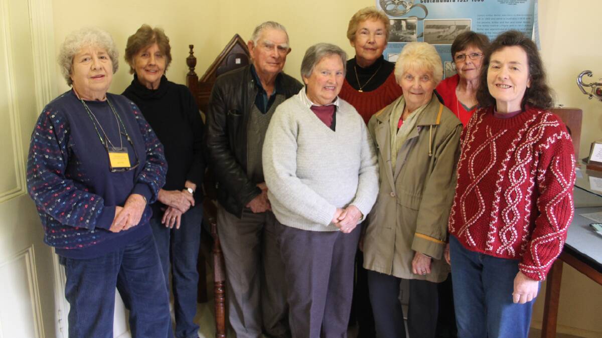 DEDICATED TEAM: The Heritage Centre is run entirely by volunteers, who are thankful for the support of the Cootamundra Shire Council and donations from visitors. Pictured (from left) inside the redone Aviation room is secretary Betti Punnett, Yvonne Forsyth, Arthur Ward, Joyce Orgill, Pat Caskie, Maria Ryan, Sharon Bennett and Janice Miller.
