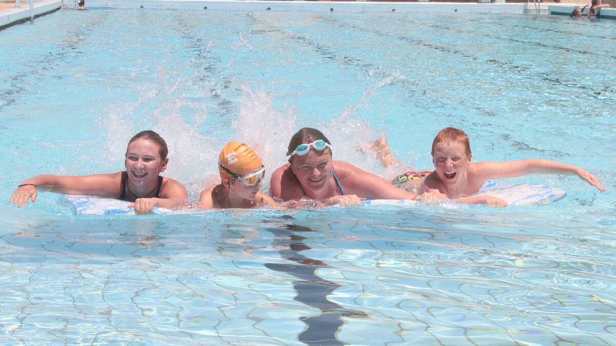 ENJOYING THEMSELVES: Having a great time competing in one of the activities at the Australia Day pool party at the town pool are the Collins family (from left) Azelyn, Kyle, Siobhan and Logan. 