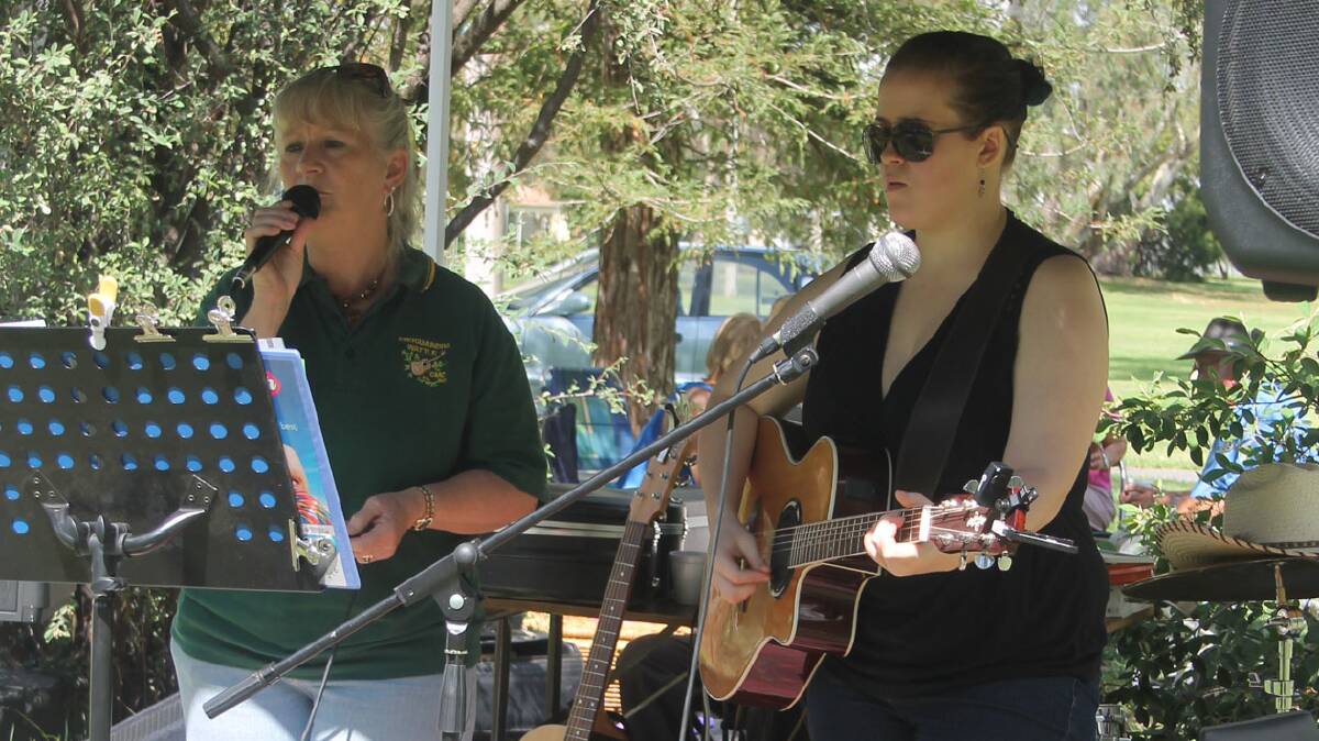 Providing 
entertainment: 
IN front of around 80 people at the recent Seniors Week barbecue in Jubilee Park, the Wattle Country Music Club’s Narelle Sellick (left) and Katie Gould shone with their live entertainment. 