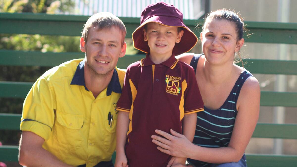 GOOD LUCK: Seth Baldry’s parents Shane and Chloe wish him all the best for his first day at school at EA Southee on Monday. Contributed
