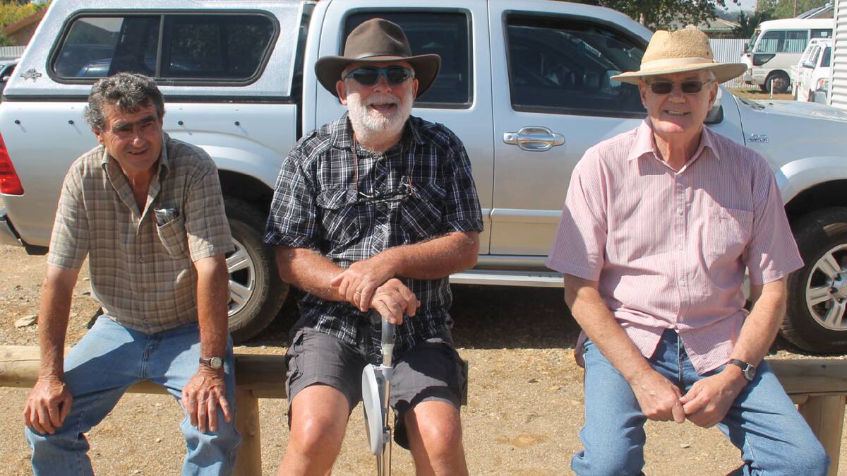 Showing their support: CHEERING on the Strikers in their game at O’Connor Park the Saturday before last were (from left) Gary Sheather, John Paterson and Anthony Wood. 
The weekend marked the official opening of what will be the home of soccer in Cootamundra. 
O’Connor Park is located in Betts Street and by all accounts the playing surface and facilities at the ground are looking top-notch. All involved in the development of the park should be proud of themselves. 