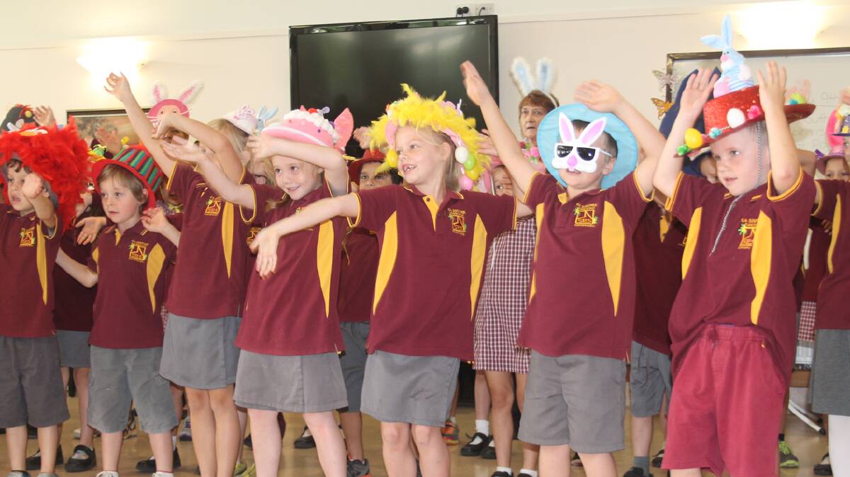 ENTERTAINING: Cootamundra Nursing Home residents received a special treat last week with a performance from EA Southee School. The students performed a few songs as well as conducting their Easter hat parade for the residents.