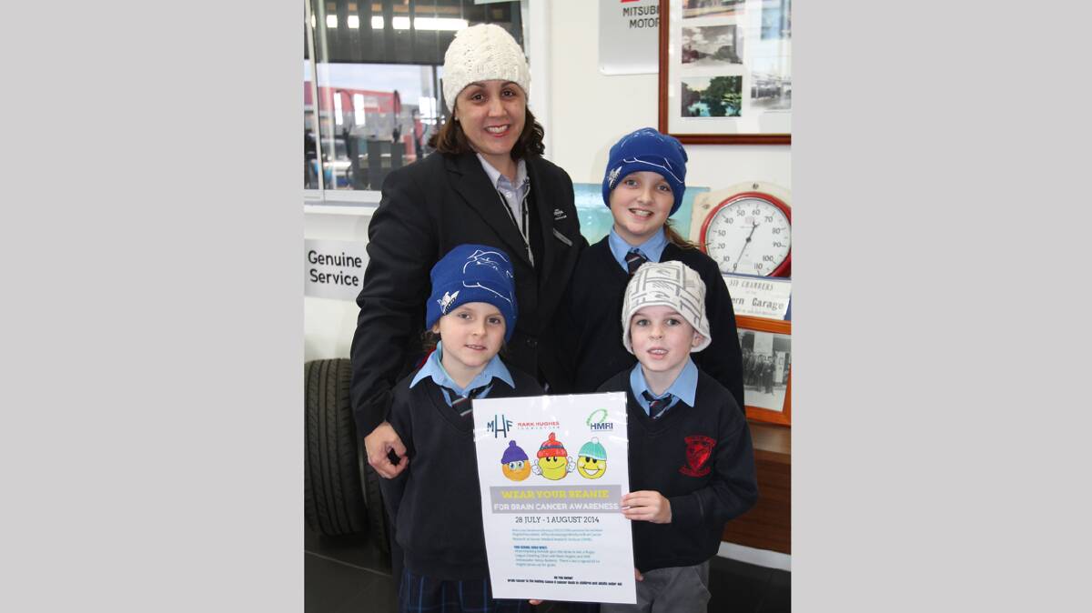  SHOWING SUPPORT: Melinda Chambers, Amelia Chambers, Scarlett Chambers and Archie Blackman wear their beanies in support of brain cancer awareness.