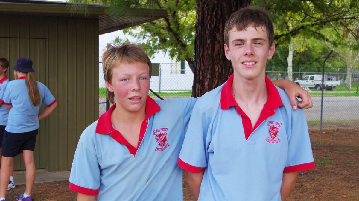 TRI-ING HARD: The Sacred Heart Central School held its triathlon for Year Nine and 10 students last Thursday and Cody James, right, came first in the 
individual section and Tyronne Owen came second. The triathlon saw the 
students swim 250 metres, undertake a one km run and cycle six kms. 
