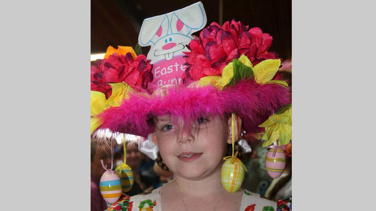  WOW: Cootamundra Public School student Emma Barnes is pictured with her amazing creation during the school’s Easter hat parade last week.
