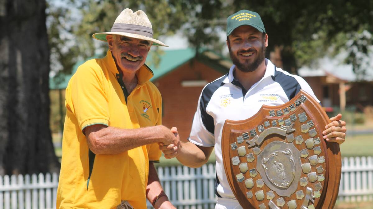 WINNERS: Pat Kerin presents Cootamundra cricket captain Nathan Corby with the Stribley Shield following their victory in last Sunday’s final. 
Photo: Melinda Chambers