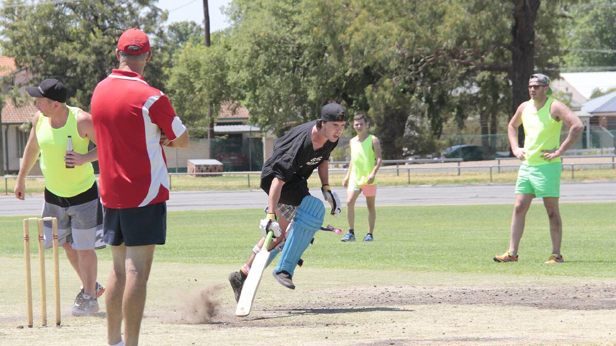  BAT SLIDE: Pictured is Jay White getting back in his ground at the recent seven a side cricket carnival which was played on Australia Day. 
Photo: Kelly Manwaring
