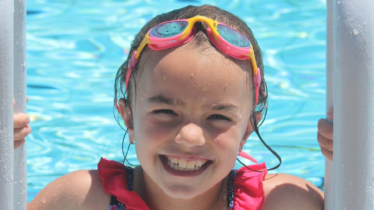  BEATING THE HEAT: Seven-year-old Matilda Menzies cools off in the town pool last weekend. Anyone visiting the pool this weekend will be issued a wrist band to allow multiple entries during the day. 
Photo: Melinda Chambers 
