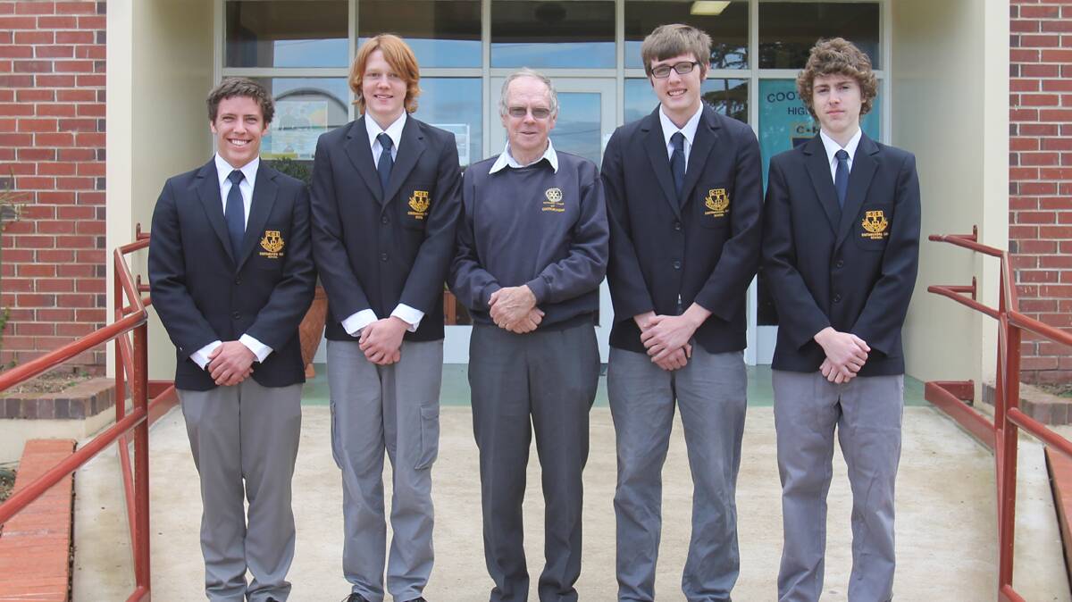  EXCITEMENT BUILDS: Cootamundra Rotary has proudly supported financially the students who have been selected for the Honeywell Engineering Summer School. Pictured with Rotarian Neil Wilcox (centre) are students (from left) Andrew Clements, Adam Martin, Ben Jackson and Liam Moston.  

