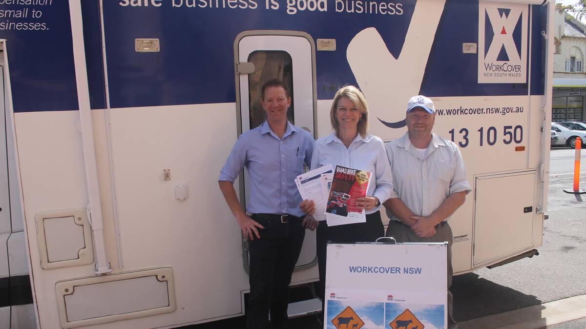  VISITING: While in Cootamundra on Tuesday Member for Burrinjuck Katrina Hodgkinson calls in on the visiting WorkCover van. She is pictured here with Brett Hoare and Jason Maynard from the van. 