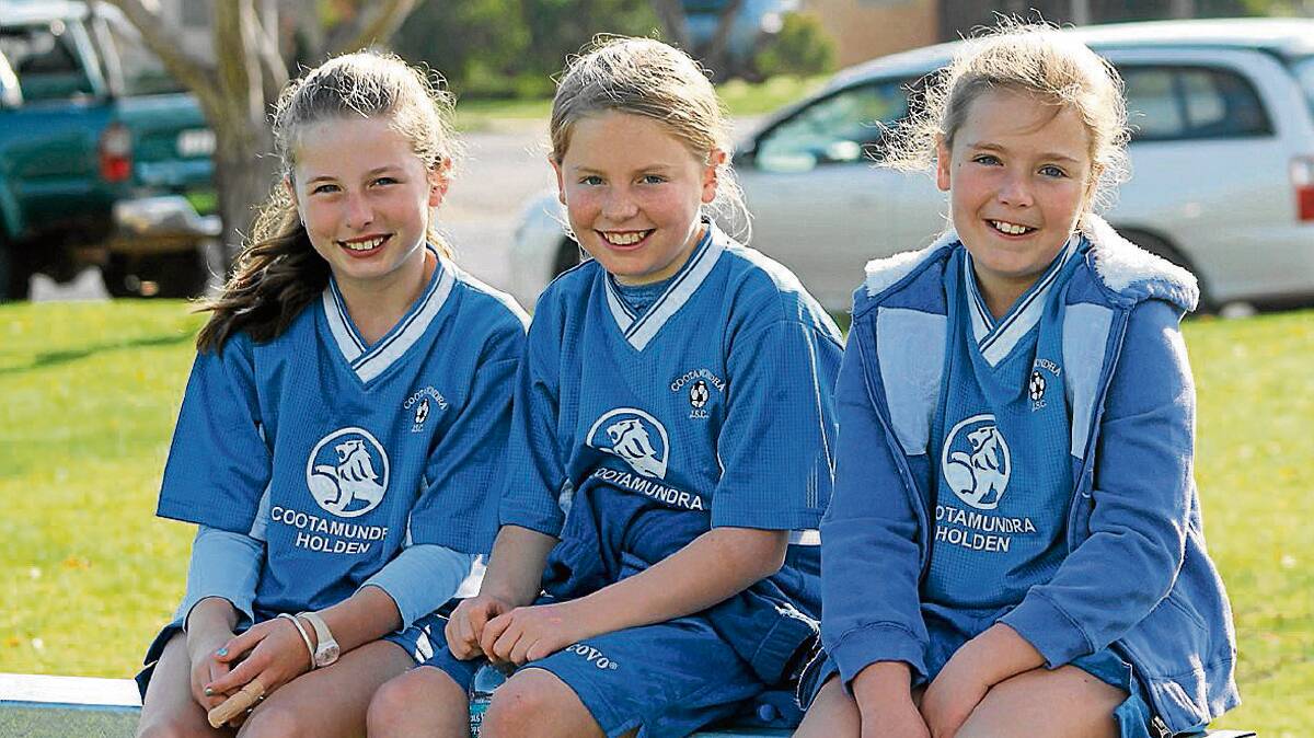 GOLDEN GIRLS: Cootamundra Junior Soccer Club players like (from left) Emily Bodycott, Piper Scott and Madeline Twyford will benefit from the money won and raised for new goal posts and nets.