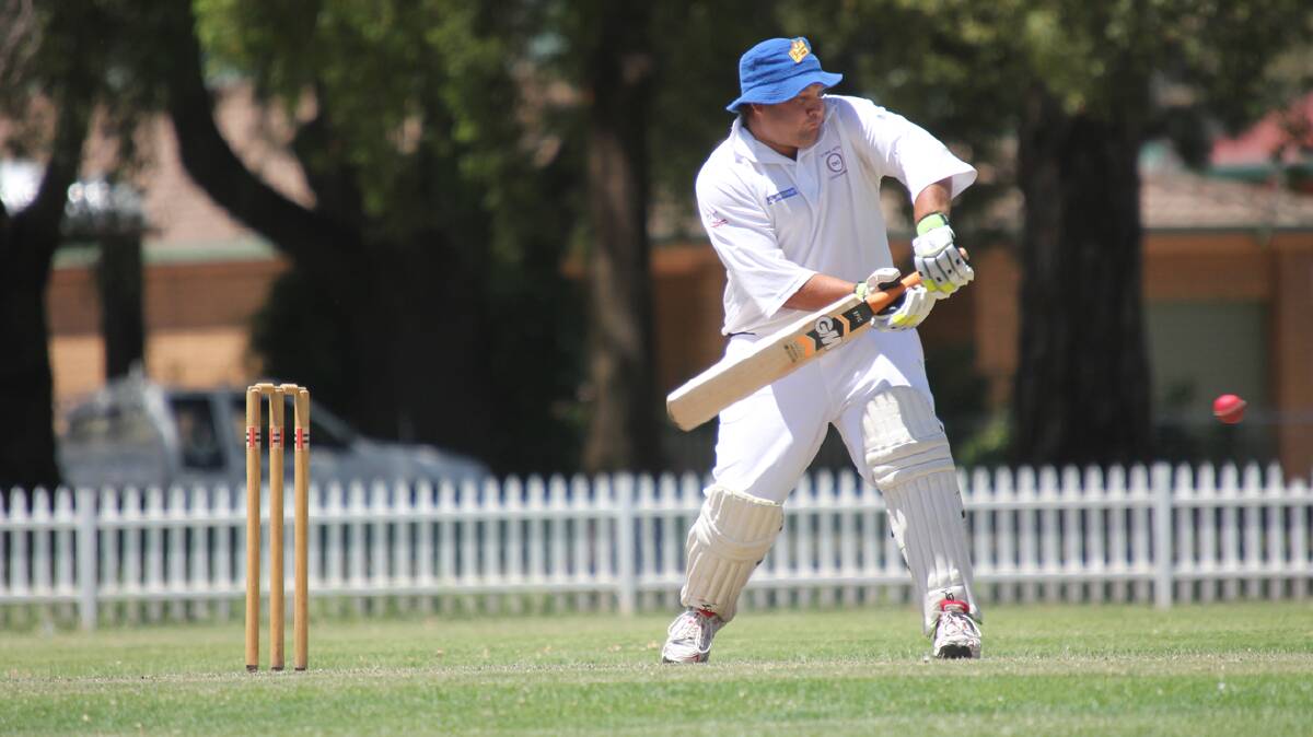  FACING UP: Country Club batsman Chris Dawe prepares to play a defensive stroke in his side’s match against Temora on Saturday. Country Club ended up winning the game by 133 runs. 

Photo: Michael Van Baast