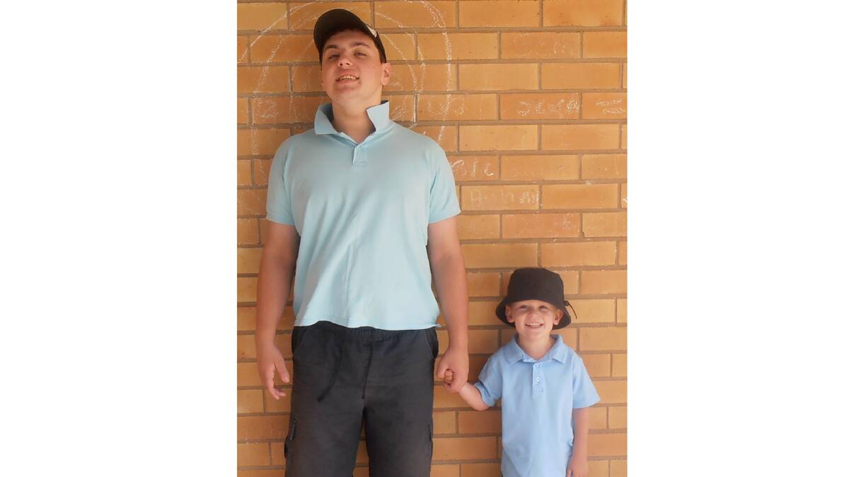  FIRST DAY AND FIRST DAY BACK: pictured (left) is Elouera Special School captain Daniel Braumueller with new kindergarten enrolment Jesse Sheather.
Photo: Contributed 
