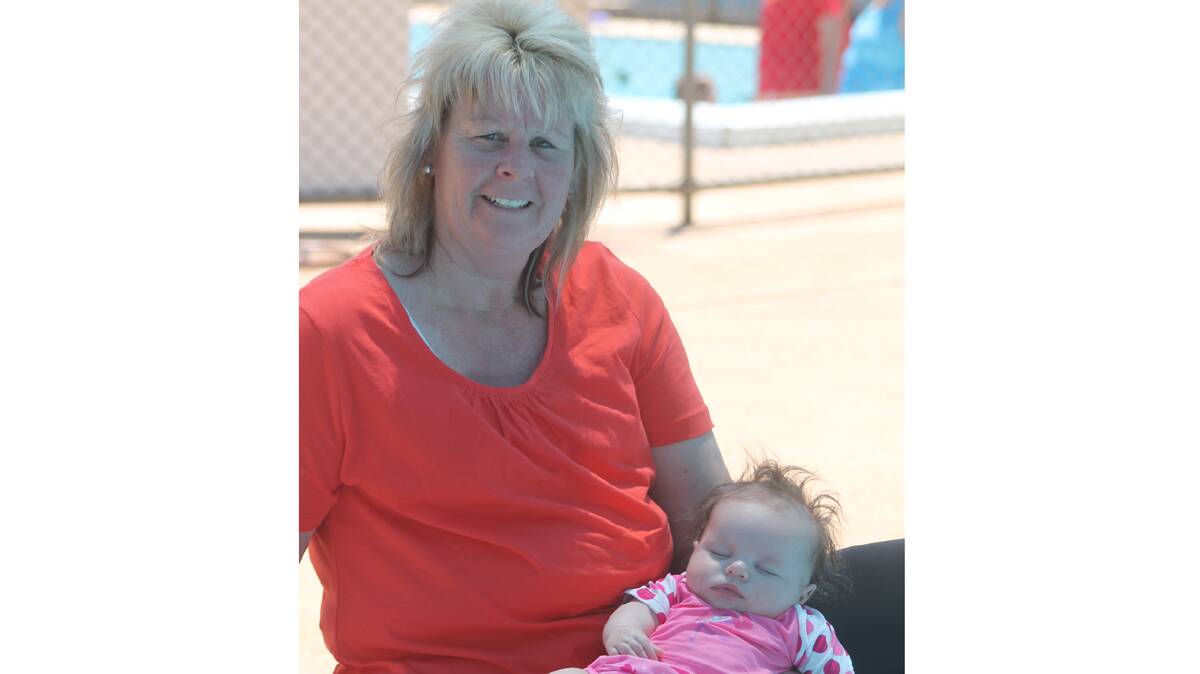 FAMILY DAY: Tracey Finucane cools off at the town pool with her gorgeous granddaughter Ava Finucane last weekend. Ava is the daughter of Joel and Melissa of Canberra. 
Photo: Melinda Chambers 
