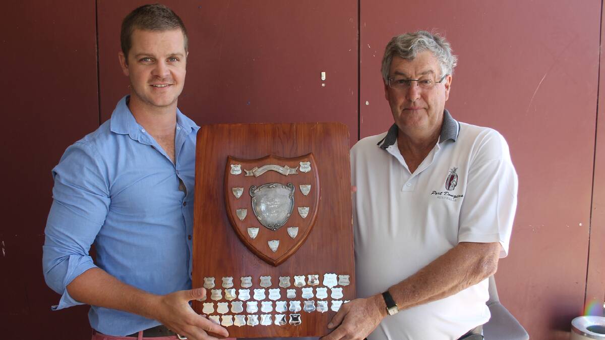 MAJOR PRIZE: pictured (left) is Cootamundra Country Club manager Phil Gay and Cootamundra Golf Club captain Garry Mason with the Scott Fuller Shield. The final round of the 
competition will take place at Cootamundra Golf course on Sunday.
