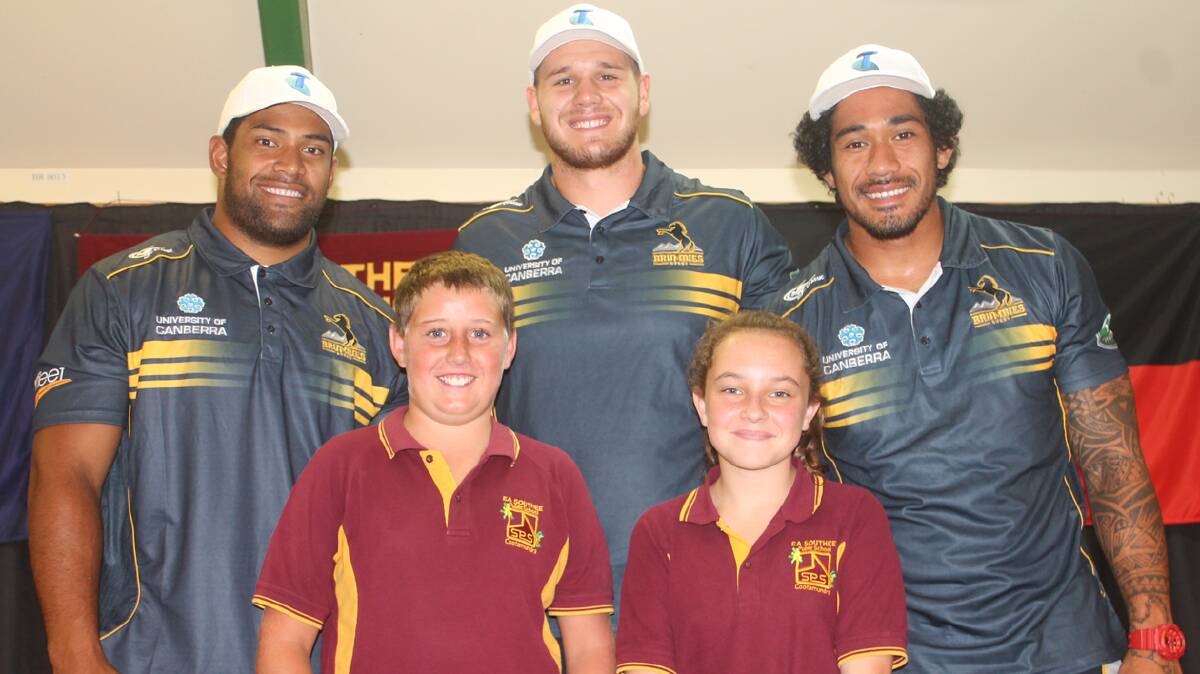  SPECIAL VISIT: pictured back (from left) are ACT Brumbies players Scott Sio, Jack Whetton and Joe Tomane with EA Southee school captains Brendan Kelleher and Sophie McDermott. The trio also visited Sacred Heart Central School.
