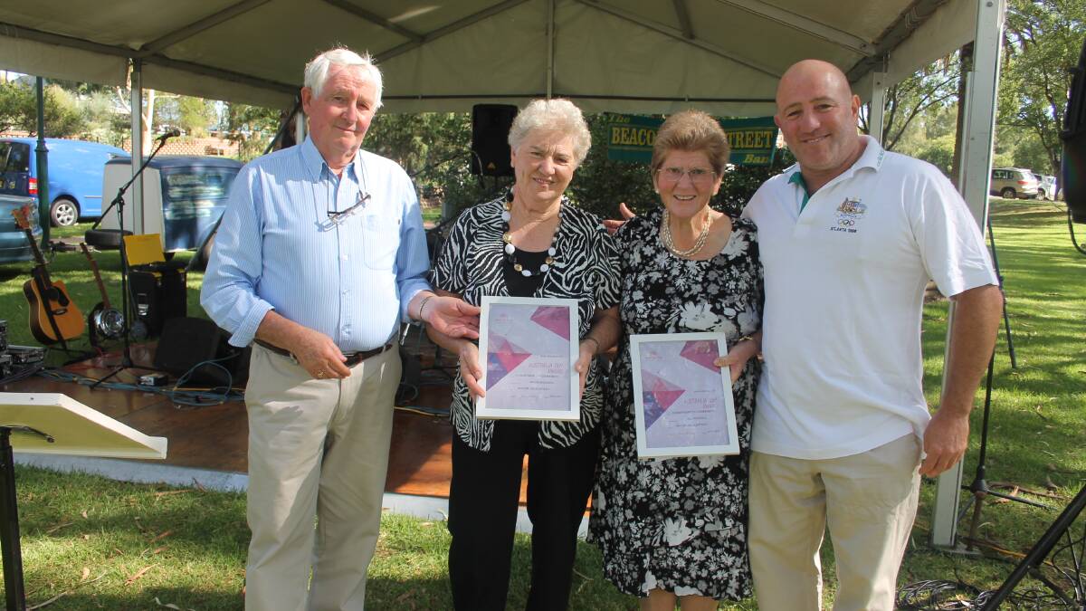  WITH MANY THANKS: While no-one volunteers for the accolades there is no doubting sisters Jill Dodwell and Mavis Bracken are very deserving of recognition. The sisters were given the Commitment to Community Award at Australia Day celebrations in Jubilee Park on Monday. Pictured (from left) are mayor Jim Slattery, Mrs Bracken, Mrs Dodwell and 2015 Ambassador for Cootamundra Rick Timperi. 
