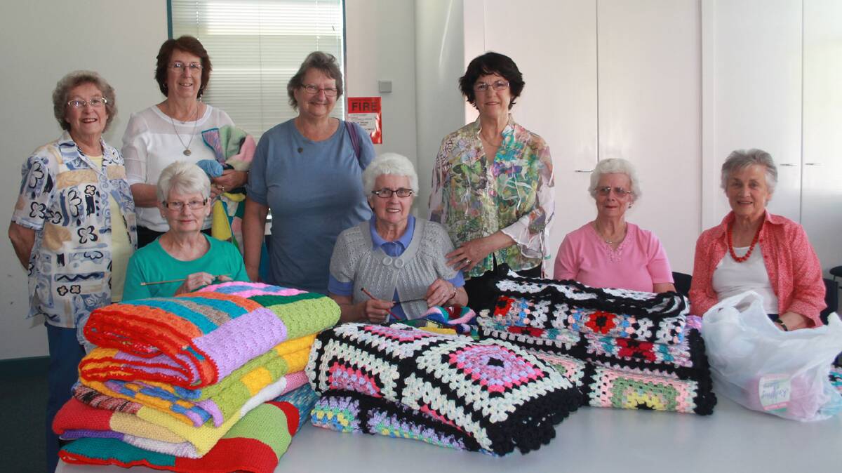  KNITTING AWAY: Pictured during the final Wrap with Love session for last year were (back, from left) Tresna Ward, Marj Boxsell, Irene Minnett and Margaret Elmes (front) Lyn Lyster, Jenny Cash, Elaine Cooper and Joy Reynolds.