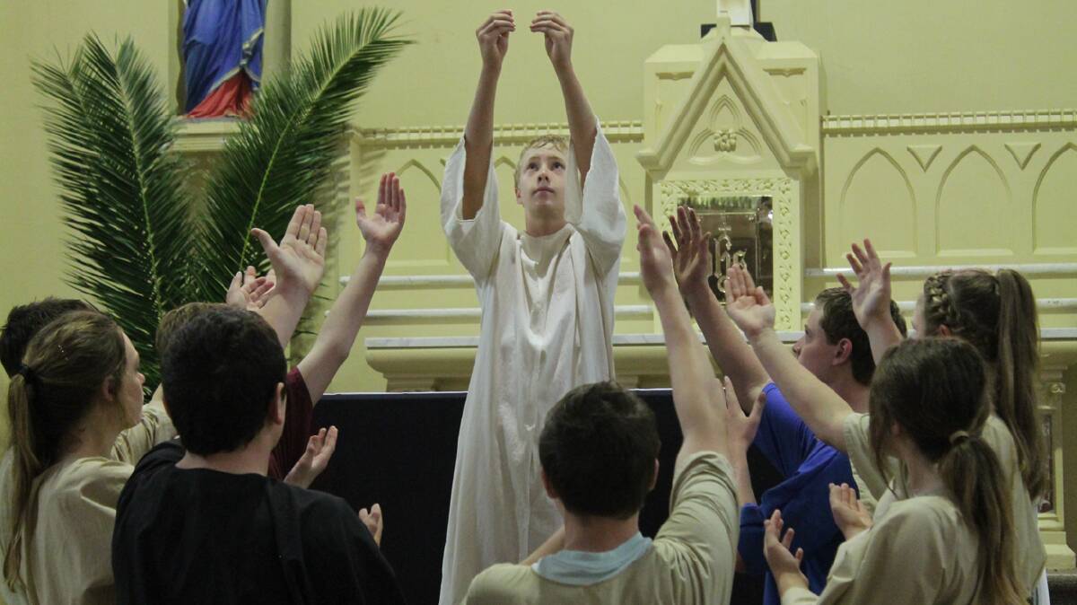 EMOTIONAL:  Pictured are Sacred Heart Central School students performing the Passion Play last week. The Passion Play is a prayer that recounts the Passion of our Lord. It was performed on Friday, April 11 to all of the students, parents and friends as well as 120 invited guests from Catholic schools in the Western Region. It will be performed again on Good Friday at 3pm. All are invited to attend. 
