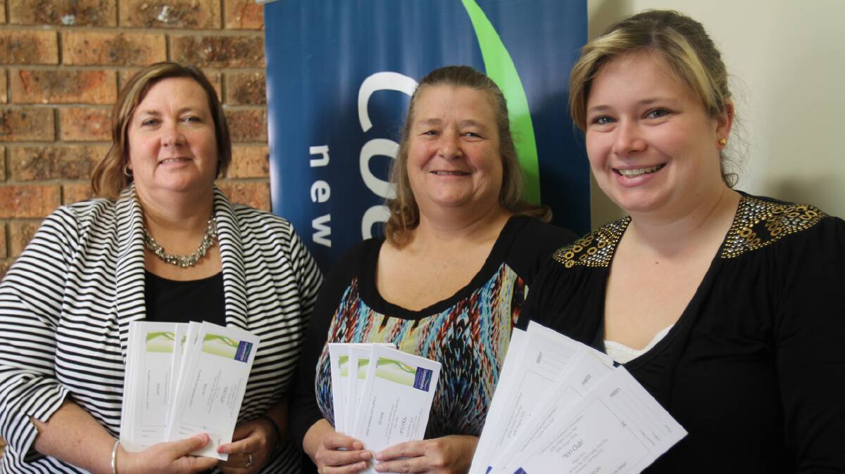  OPPORTUNITY: Cootamundra Development Corporation’s (from left) Sharon Breese, Gail Haines and Ashleigh Warton are pictured with the Wattle Time Fair 100 club tickets. The winner of the 100 club will be named corporate sponsor of this year’s Wattle Time Fair – a fantastic promotional opportunity for businesses.