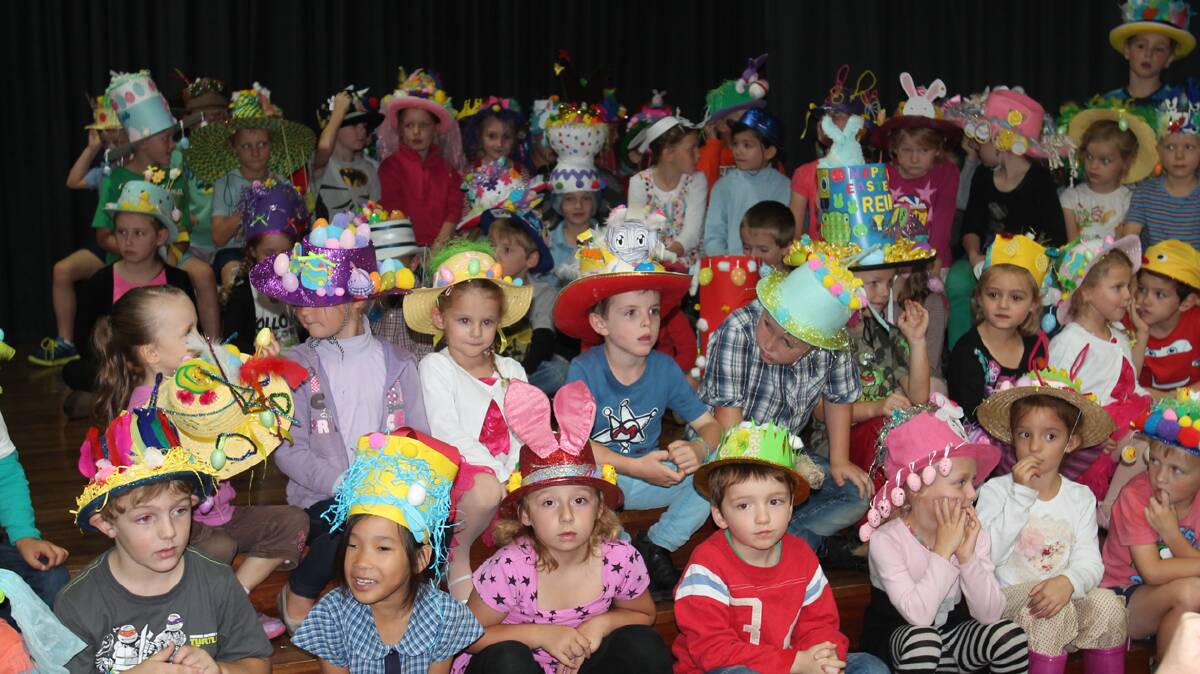 FANTASTIC HATS: Pictured performing some songs during their recent Easter Hat Parade were the students of Cootamundra Public School.
