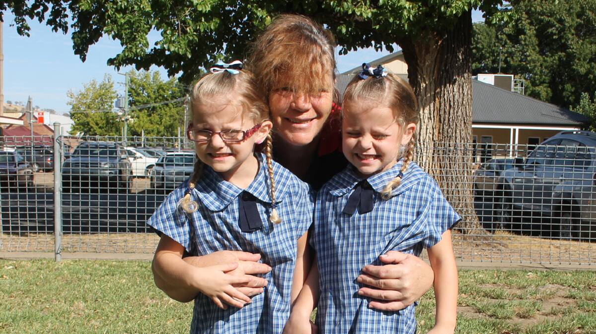  BIG STEP: Pictured (from left) are Grace McLaren, Trish Palleine and Mia McLaren at Cootamundra Public School on Monday. The school welcomed their new kindergarten students this week.