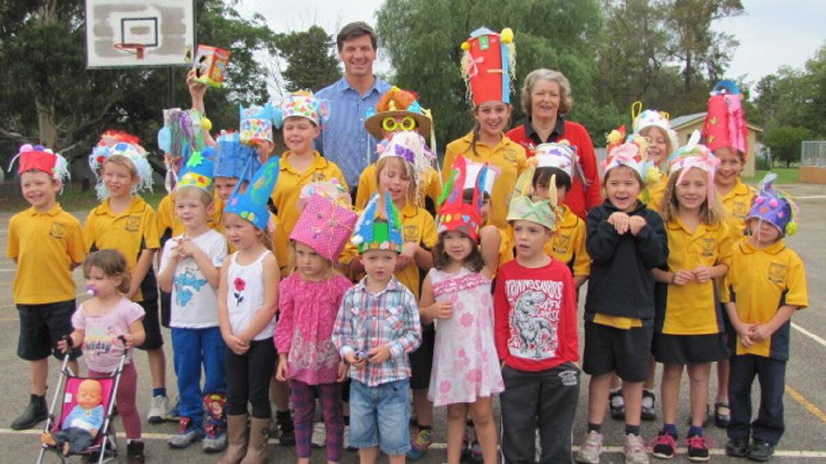 IN TOUCH: Member for Hume Angus Taylor visited Stockinbingal Public School last week carrying out the important task of judging the Easter hat parade. 
