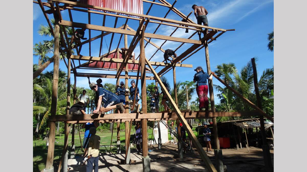  LENDING A HAND: One of the stilt houses built by the Hennessy Catholic College contingent who travelled to Cambodia last month. 