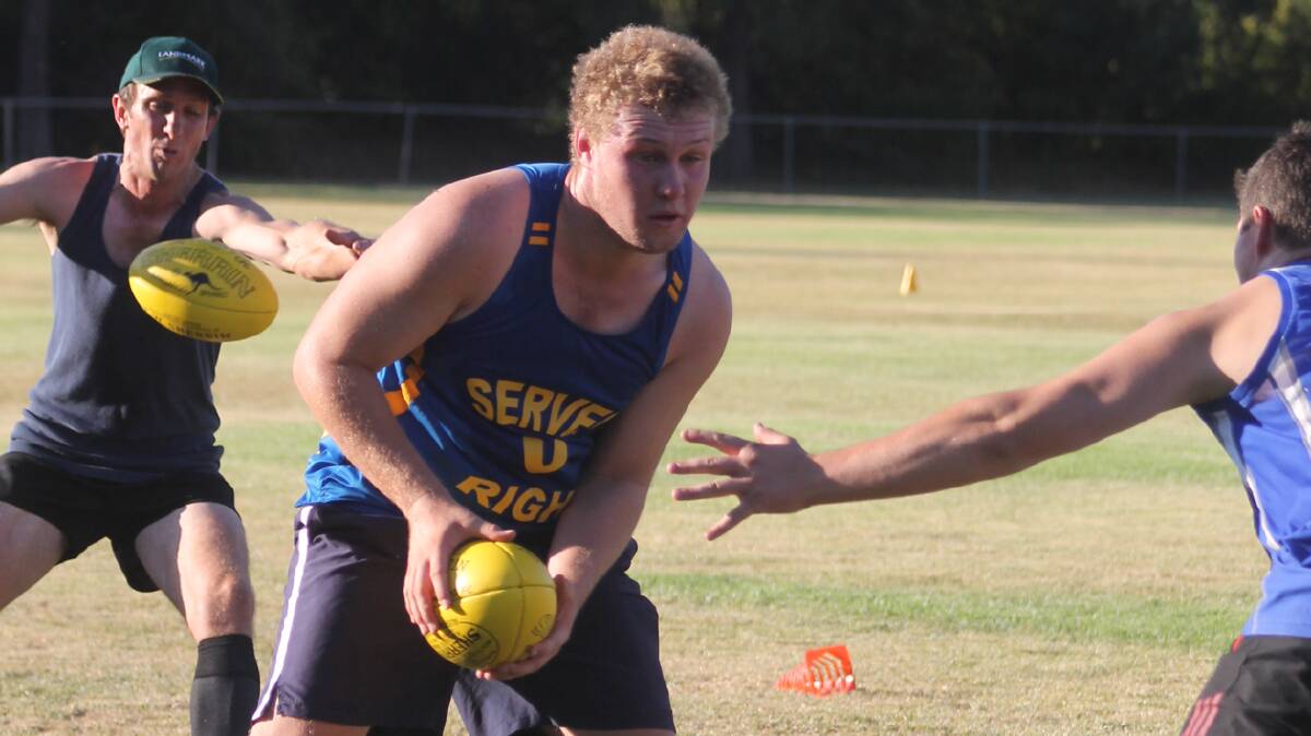  BALL DRILLS: Blues player Brad Piffero trains with the rest of the team at Clarke Oval last Friday. 

Photo: Melinda Chambers