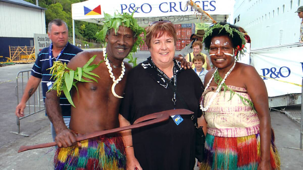 DIANE’S SOUTH PACIFIC CRUISE: 
LOCAL lady Diane Wilde has recently returned from the trip of a lifetime where she travelled around the South Pacific islands, together with friends and family from Gundagai and Sydney.
Diane departed from Sydney on March 25, travelling on the luxury cruise liner The Pacific Pearl making stops at Noumea, Lifou, Port Vila, Mystery Island and the Isle of Pines, which Diane said was her most favourite and beautiful locations.
Diane enjoyed experiencing the South Pacific cultures.
This was Diane’s first overseas trip and she is pictured in this GRAND shot with some of the locals of Vanuatu during their stopover in Vila.
