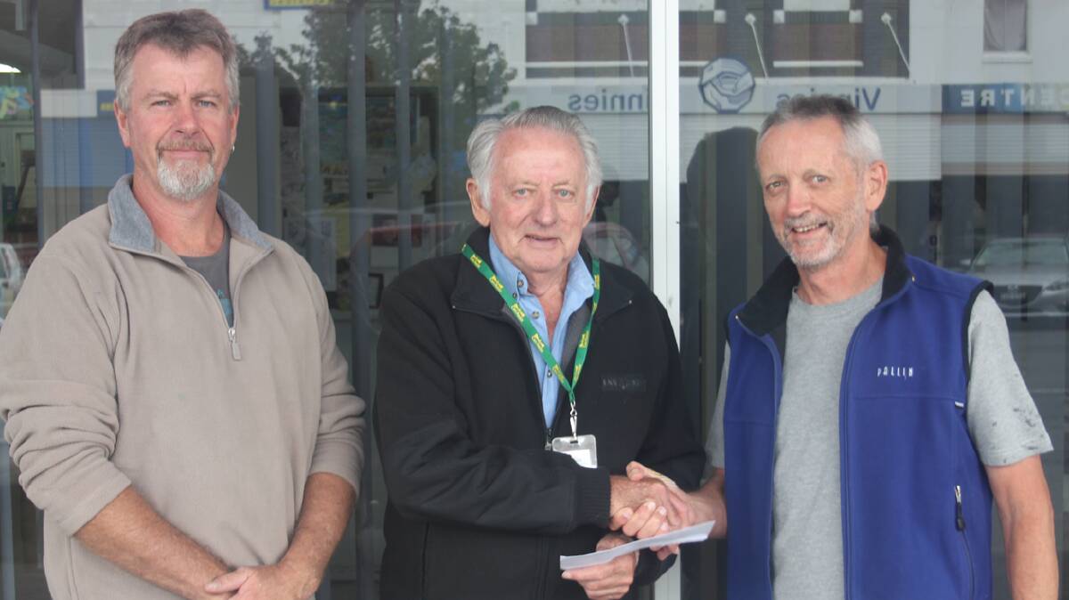  WITH THANKS: Handing over funds raised through a recent, highly successful Blues Night at the Arts Centre to Can Assist are (from left) musician Ben Visser, Can Assist treasurer Neil Murray and musician Bob Guy. 