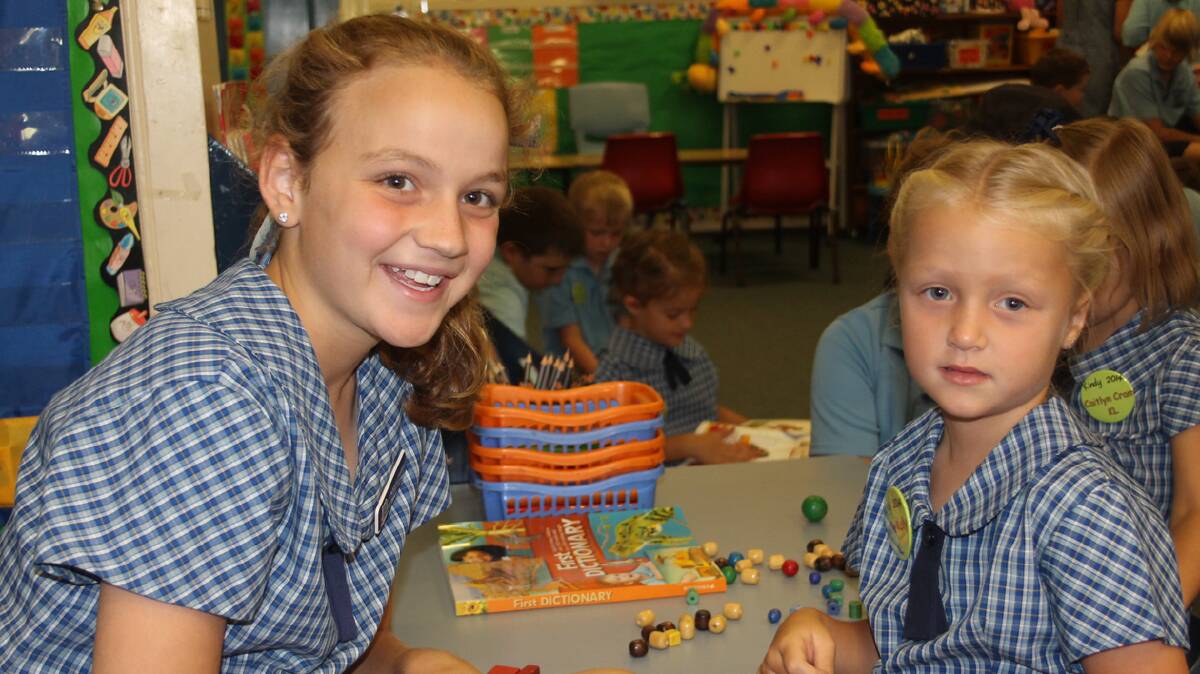 SHOWING HER THE ROPES: Pictured (left) is Abby Bailey with Hallie Kelly at 
Cootamundra Public School on Monday.