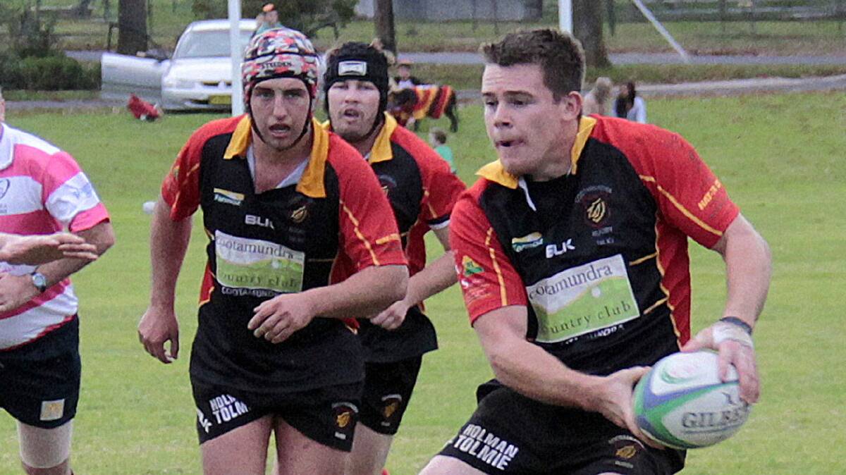 PLAYED WELL: Dafydd Pritchard (with the ball) had the honour of being listed in the try-scorers in both first and second grade in Leeton on Saturday. After a couple of weeks out on holidays, this talented Welshman certainly made his return presence felt. In support of Pritchard during this recent home game is Isaac Mitchell (in the coloured headgear) who suffered a concussion on Saturday and will miss this weekend’s Illabo round as a result. 

Photo: Kelly Manwaring 