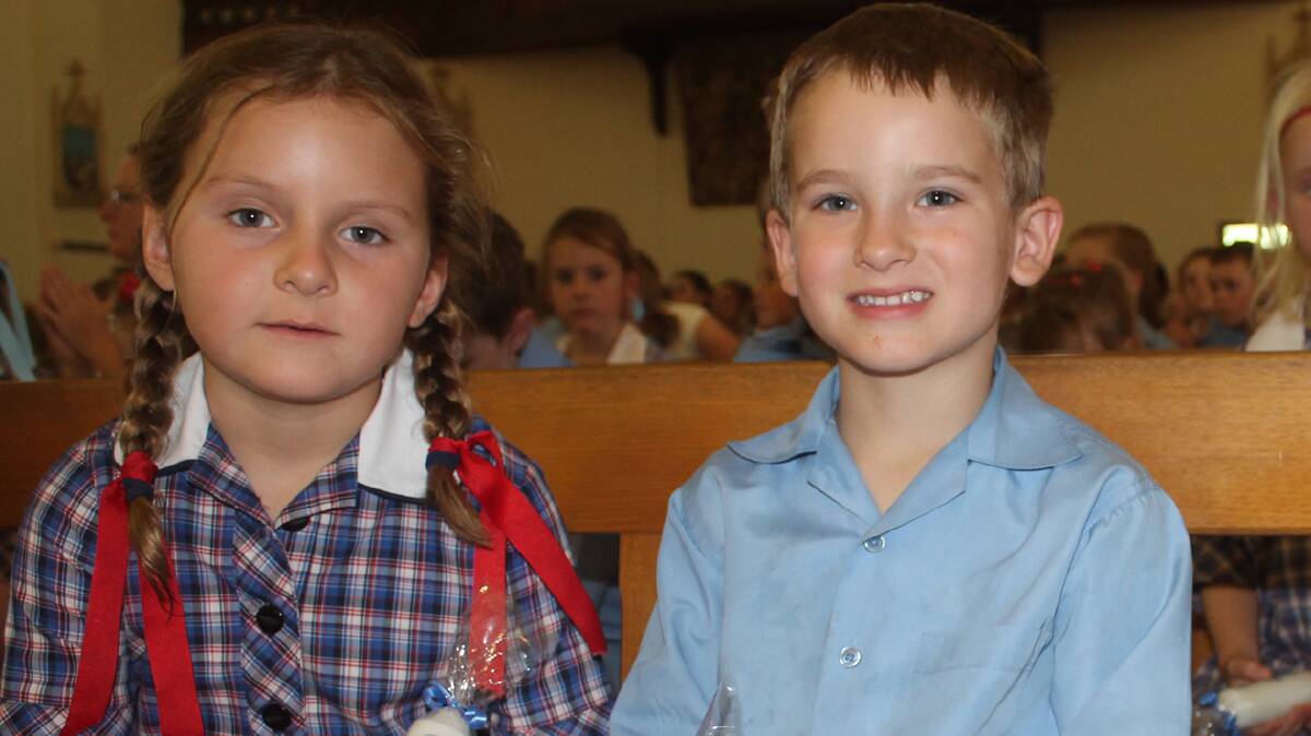  SPECIAL DAY: It was a very special day for Sacred Heart Central School students Scarlett Chambers and Kaiden Benson, when they attended their welcome Mass last week. The kindergarten students were all presented a candle by Father Kevin Barry-Cotter.
