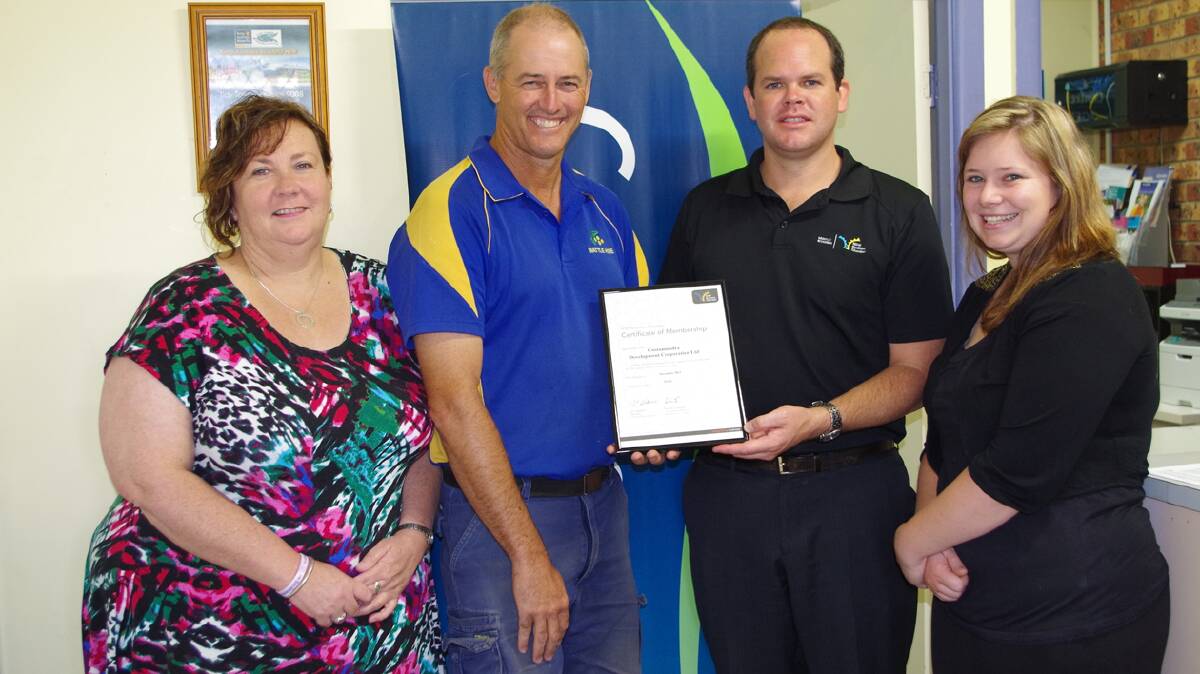  MORE FOR LOCAL BUSINESS: NSW Business Chamber Murray Riverina regional manager Ben Foley (second from right ) presents the CDC’s (from left) office manager Sharon Breese, chairman John Stephens and Ashleigh Warton with a certificate recognising the formal partnership between the two 
organisations. 