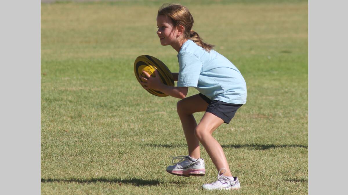 READY: Cootamundra’s Pip Crawford plans her attack during the first round of junior touch football matches at Nicholson Park this week.