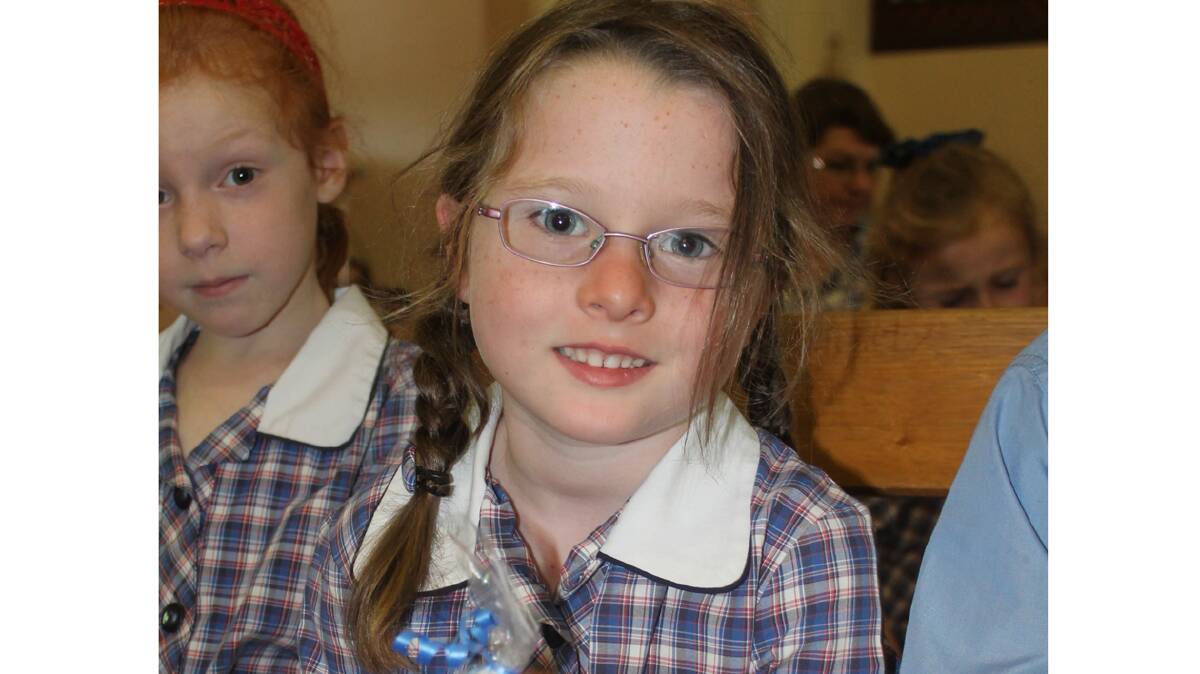 SCHOOL JOURNEY: Sacred Heart Central School student Zara Bodycott started her school journey last week. All of the kindergarten students were presented with a school candle at the welcome Mass held last week.