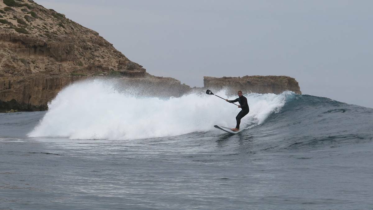 Eyre Peninsula: A surfer catches a wave at Elliston. Picture: Marie Clark.